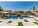 Beautiful pool and backyard oasis, perfect for relaxing and entertaining guests at 551 E Sun Valley Farms Ln, San Tan Valley, AZ 85140