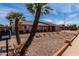 A charming single Gathering home with low maintenance desert rock landscaping and an attached two car garage at 5721 W Palo Verde Ave, Glendale, AZ 85302