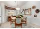 Cozy breakfast nook featuring a round table, comfortable seating, and a bright window with southwestern decor at 5830 E Mckellips Rd # 120, Mesa, AZ 85215