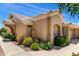 Side view of charming single-story home featuring desert landscape at 5830 E Mckellips Rd # 120, Mesa, AZ 85215