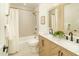 Beautiful bathroom featuring a double vanity with wood cabinets, and a bathtub with shower at 628 N Hobson --, Mesa, AZ 85203