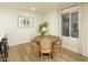 Bright dining area features modern furnishings and a large window with natural light at 628 N Hobson --, Mesa, AZ 85203