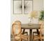 Dining area features round wood table with seating for four at 628 N Hobson --, Mesa, AZ 85203