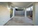 Covered patio featuring concrete flooring, neutral color palette and backyard access at 628 N Hobson --, Mesa, AZ 85203