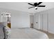 Bedroom with ensuite bath, and light wood floors throughout at 635 N 67Th Pl, Mesa, AZ 85205