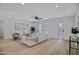 Bright, airy living room with hardwood floors, recessed lighting, and tastefully neutral decor at 635 N 67Th Pl, Mesa, AZ 85205