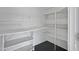 Functional pantry space with built-in shelving for organized storage of groceries and household items at 635 N 67Th Pl, Mesa, AZ 85205