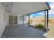 Covered patio overlooks the low-maintenance backyard, perfect for outdoor relaxation and entertainment at 635 N 67Th Pl, Mesa, AZ 85205