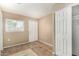 Bedroom with a window, a closet and a door at 649 S Temple St, Mesa, AZ 85204