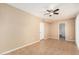 Bedroom with neutral walls, ceiling fan, and tile flooring at 649 S Temple St, Mesa, AZ 85204