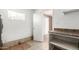 Bright utility room with tile flooring and ample shelf space at 649 S Temple St, Mesa, AZ 85204