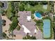 Expansive estate with pool, tennis court, putting green, and lush landscaping at 6624 N 66Th N Pl, Paradise Valley, AZ 85253