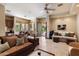 Spacious living room with tile floors and comfortable seating at 6624 N 66Th N Pl, Paradise Valley, AZ 85253