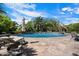 Beautiful outdoor pool with waterfall feature and lounge chairs at 6624 N 66Th N Pl, Paradise Valley, AZ 85253