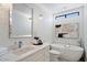 Elegant bathroom with a soaking tub, modern fixtures, and stylish decor at 7222 E Gainey Ranch Rd # 241, Scottsdale, AZ 85258