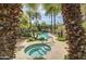 Beautiful community pool area featuring a spa, swimming pool and plenty of seating areas at 7222 E Gainey Ranch Rd # 241, Scottsdale, AZ 85258