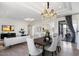 Bright, open floor plan with a dining area, living room, and modern decor at 7222 E Gainey Ranch Rd # 241, Scottsdale, AZ 85258