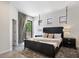 Serene bedroom with dark wood furniture, balcony access, and natural light at 7222 E Gainey Ranch Rd # 241, Scottsdale, AZ 85258