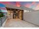 Private patio with awning perfect for outdoor entertaining and enjoying beautiful sunset views at 7222 E Gainey Ranch Rd # 241, Scottsdale, AZ 85258