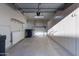 Spacious garage with built-in storage and shelving at 7710 E Gainey Ranch Rd # 142, Scottsdale, AZ 85258
