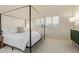 Tranquil main bedroom with a canopy bed, modern decor, and ample natural light at 7710 E Gainey Ranch Rd # 142, Scottsdale, AZ 85258