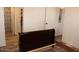 Bedroom with views into the closet and bathroom featuring wood-look floors for a modern touch at 7807 E Main St # G-23, Mesa, AZ 85207