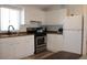 Kitchen features modern appliances and ample cabinet space for storage and organization at 7807 E Main St # G-23, Mesa, AZ 85207