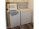Bright laundry area with a washer and dryer set for convenient home care at 7807 E Main St # G-23, Mesa, AZ 85207