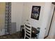 A small office space with a desk, chair, and a view of the window at 7807 E Main St # G-23, Mesa, AZ 85207