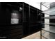 Custom closet featuring built-in shelving, drawers, and ample storage space at 7940 E Quill Ln, Scottsdale, AZ 85255