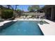 Stunning pool with clear blue water and lounge chairs, perfect for relaxation and outdoor enjoyment at 7940 E Quill Ln, Scottsdale, AZ 85255