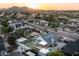 Aerial view of the property showcasing backyard with pool and convenient proximity to local amenities at 8037 E Krail St, Scottsdale, AZ 85250