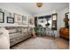 Eclectic living room showcases a rustic bench, curated artwork, and a bright window with stylish decor accents at 8037 E Krail St, Scottsdale, AZ 85250