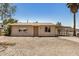 Charming single-story home with a gravel yard and a covered parking area in a sunny, suburban setting at 8101 E 4Th Ave, Mesa, AZ 85208