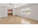 Open concept living room boasting tile floors, lots of natural light, and views into the kitchen area at 8101 E 4Th Ave, Mesa, AZ 85208