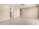 Spacious bedroom with tile floors, ensuite bathroom, and walk-in closet at 8124 N 45Th Ave, Glendale, AZ 85302