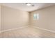 Bright bedroom with tile floors and a window offering neighborhood views at 8124 N 45Th Ave, Glendale, AZ 85302