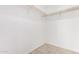 Walk-in closet with wood clothing rods at 8124 N 45Th Ave, Glendale, AZ 85302