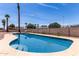 Sparkling blue backyard pool featuring steps and a stone-look deck, perfect for relaxing and entertaining at 8124 N 45Th Ave, Glendale, AZ 85302
