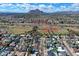 Aerial view shows proximity to athletic fields and picturesque mountain views against a blue sky at 8326 E Valley View Rd, Scottsdale, AZ 85250