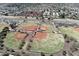 Aerial view shows houses near a baseball field and a busy highway at 8326 E Valley View Rd, Scottsdale, AZ 85250