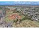 Aerial view with ball fields and parks easily accessible to homes in the community at 8326 E Valley View Rd, Scottsdale, AZ 85250