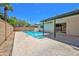 Backyard with a refreshing swimming pool and lounge area, great for relaxing and enjoying sunny days at 8326 E Valley View Rd, Scottsdale, AZ 85250