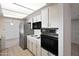 This updated kitchen features stainless steel appliances and lots of natural light at 8326 E Valley View Rd, Scottsdale, AZ 85250