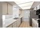 Bright kitchen features white cabinets, stainless steel appliances, and an open layout at 8326 E Valley View Rd, Scottsdale, AZ 85250