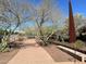 Scenic park walking path with desert landscaping and art installation at 8326 E Valley View Rd, Scottsdale, AZ 85250