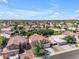 Aerial view of a residential neighborhood showcasing well-maintained homes and lush greenery at 8931 W Alex Ave, Peoria, AZ 85382
