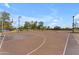 Outdoor community basketball court featuring multiple hoops and ample space for recreational play at 8931 W Alex Ave, Peoria, AZ 85382