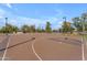 Outdoor community basketball court featuring multiple hoops and ample space for recreational play at 8931 W Alex Ave, Peoria, AZ 85382