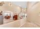 Grand foyer with soaring ceilings, elegant staircase, dining area and views of the living spaces at 8931 W Alex Ave, Peoria, AZ 85382